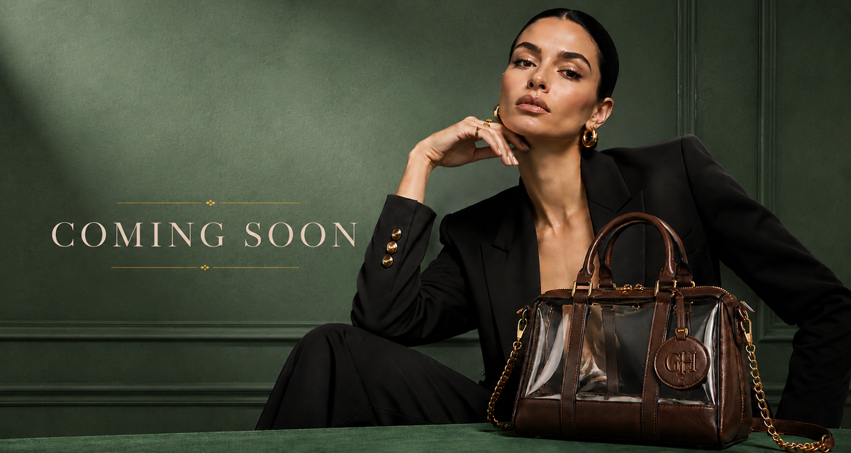 Man wearing a tan leather crossbody bag in the Glasshaus studio campaign